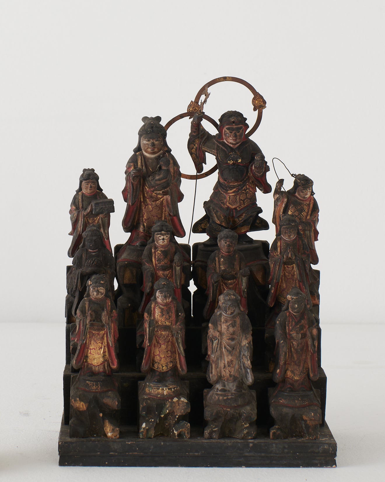 SET OF CARVED WOOD AND POLYCHROME LOHAN